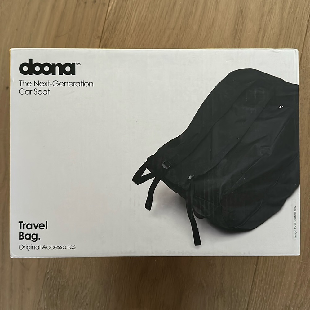 Never been used Doona Car Seat Travel Bag.